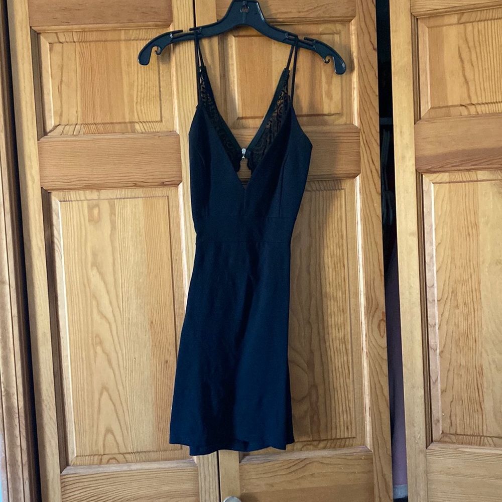 Lace racer back black mini dress